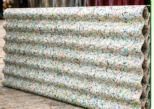 Corrugated recycled plastic roofing sheets stacked together