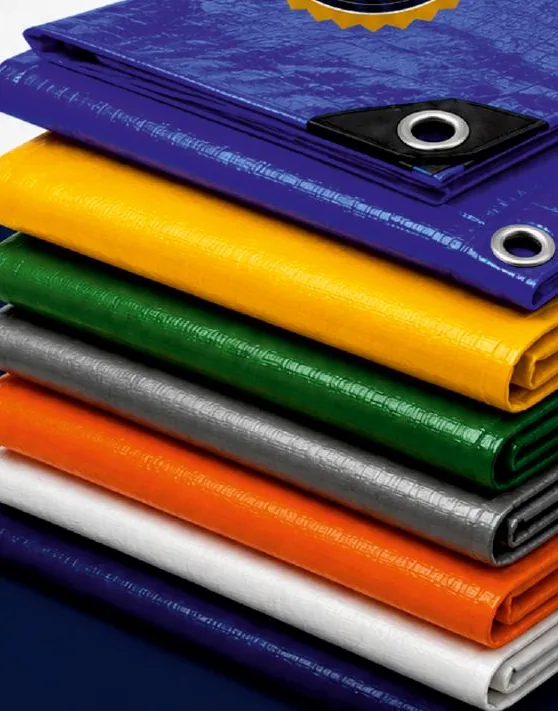 Stack of tarpaulins in blue, yellow, green, grey, orange and white