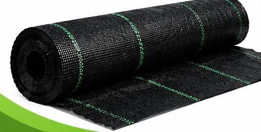 Roll of black woven weed control mat with green guide lines